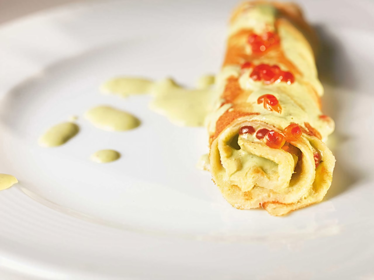 Rye Pancakes with Green Onion, Cilantro, Sour Cream, and Red Caviar Sauce