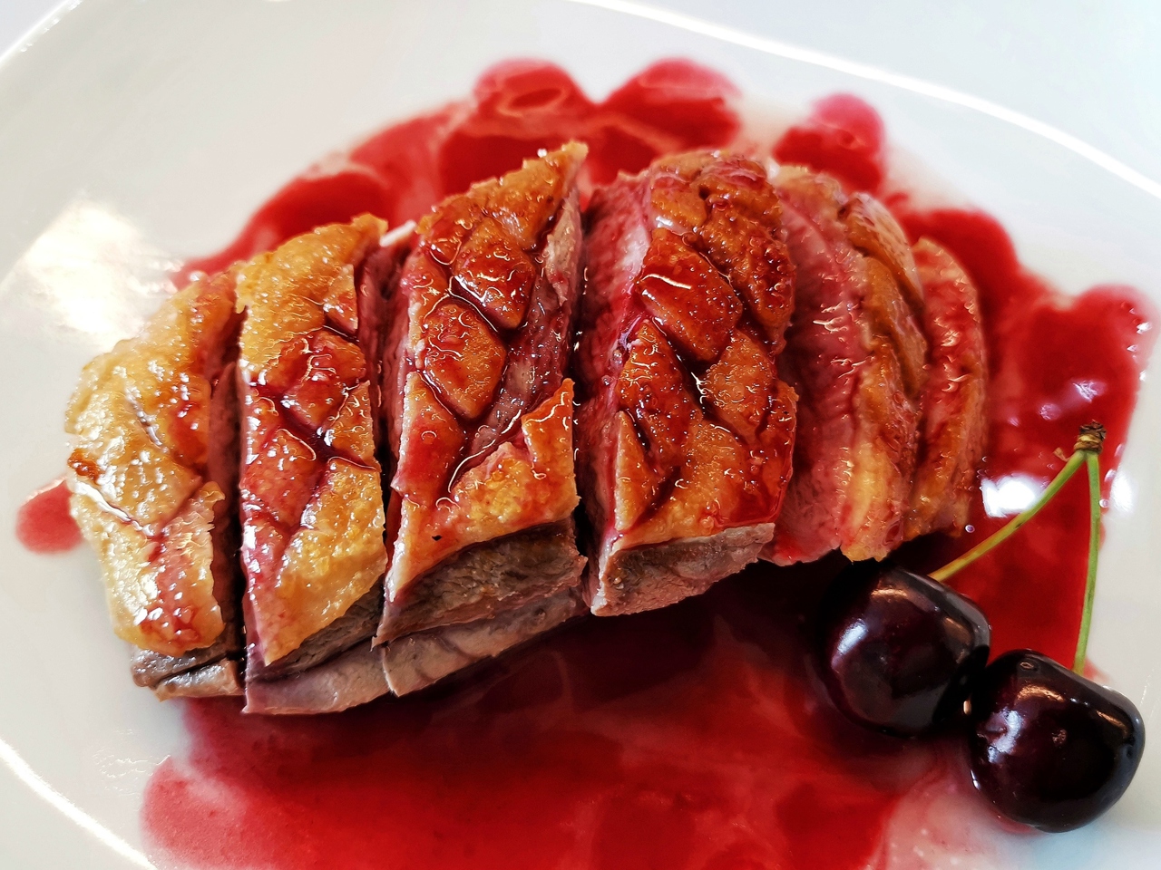 Duck Confit with Cherry Sauce