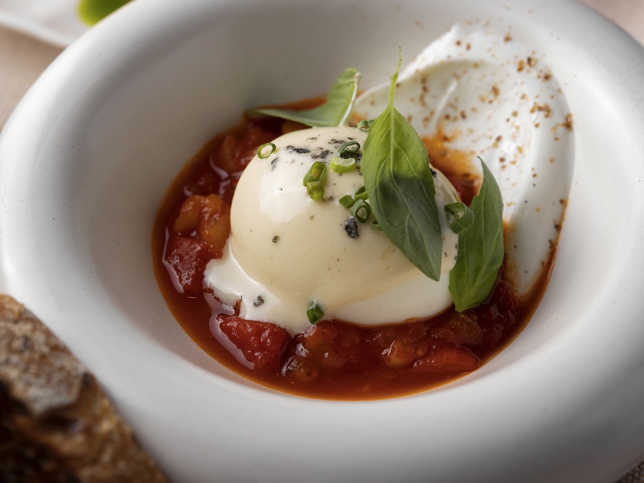 Egg with Matbucha and Cream Sauce