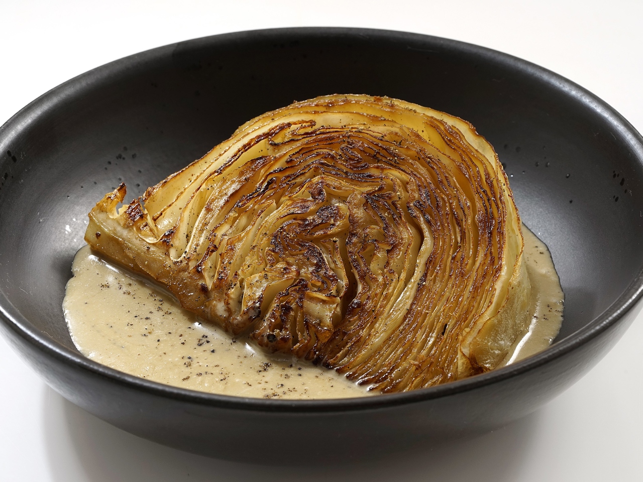 Cabbage Steaks with Pepper-Cream Sauce