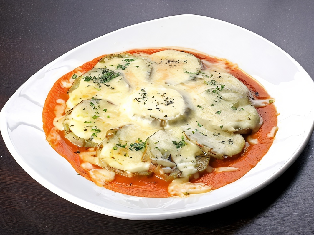 Baked Eggplants with Herbs, Tomato Sauce, and Parmesan – French recipe