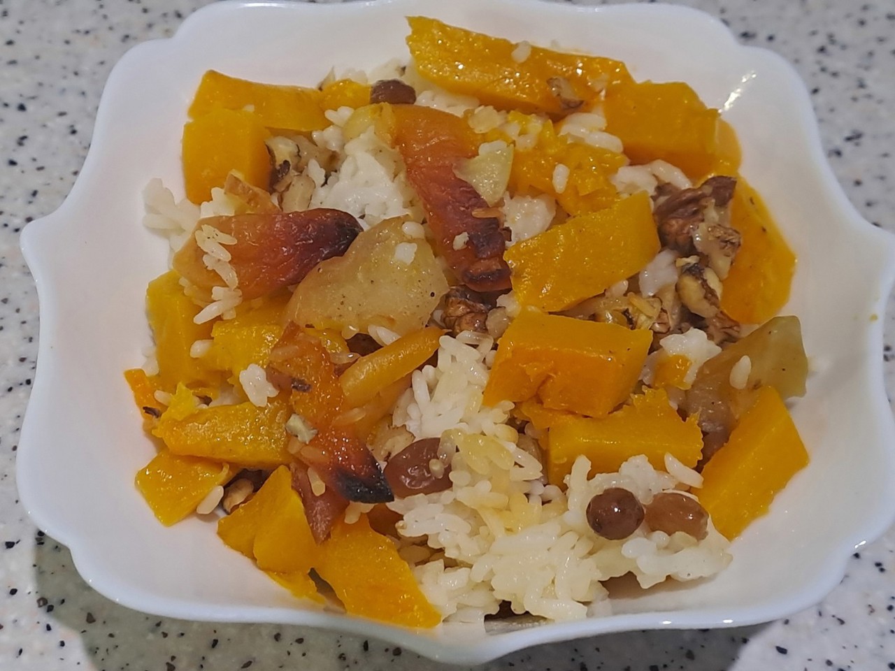 Baked Pumpkin with Rice, Raisins, Dried Apricots, and Apple