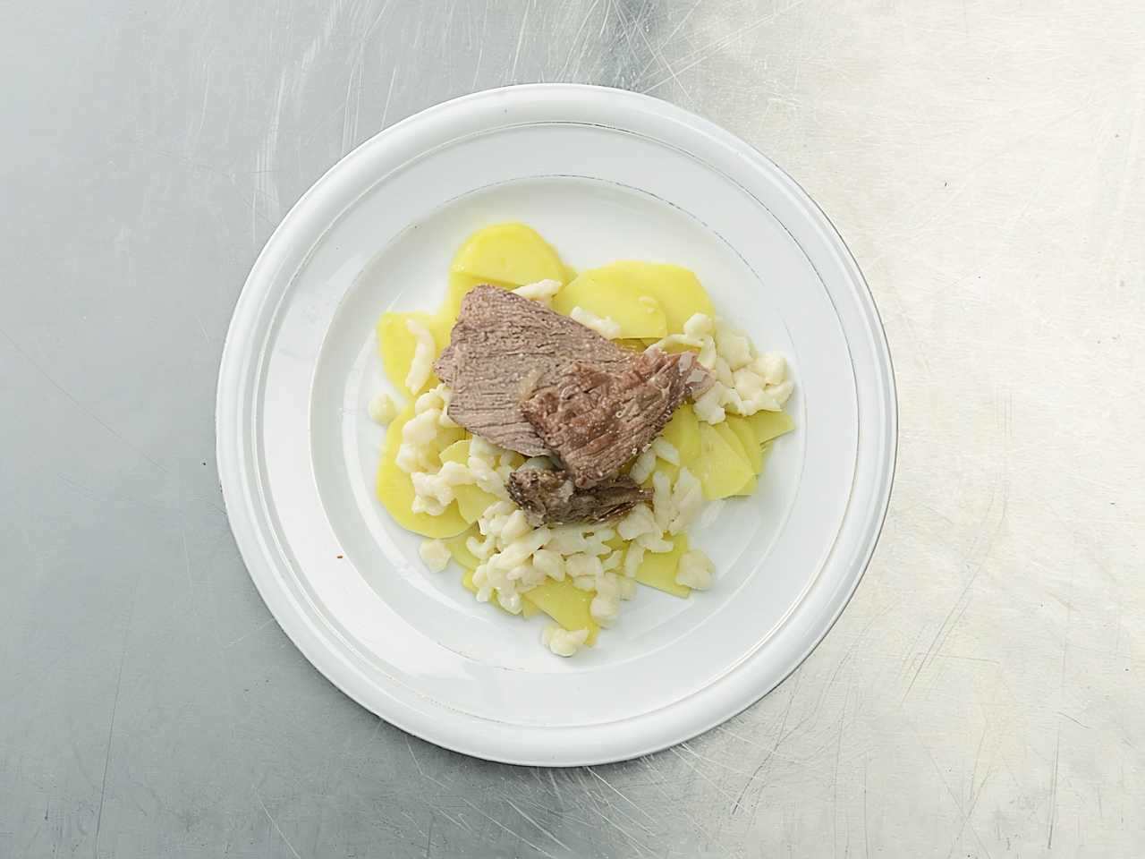 Spaetzle with Stewed Meat and Potatoes