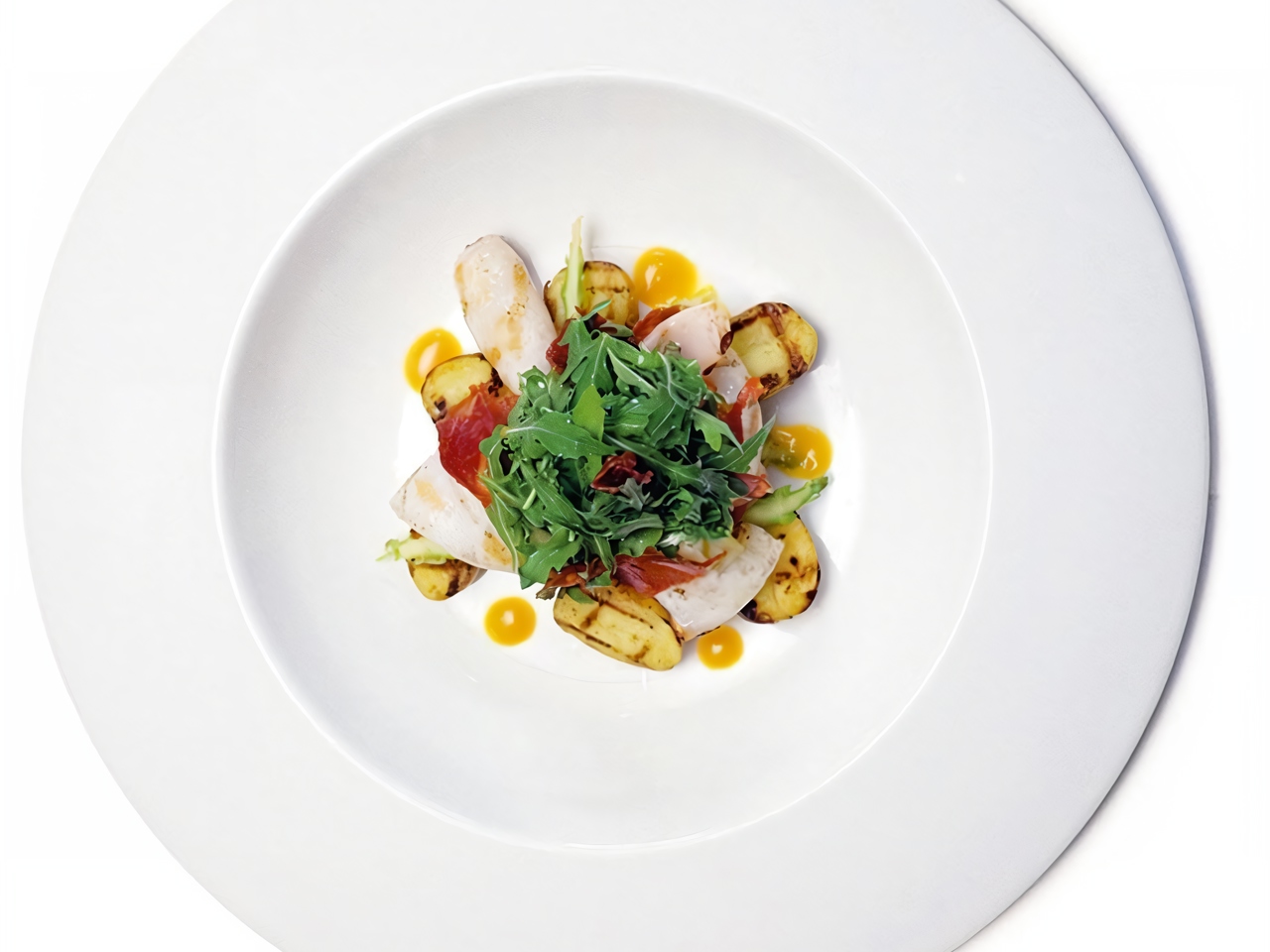 Grilled Squid Salad with Young Potatoes, Chorizo, Arugula Leaves, and Passion Fruit Pulp
