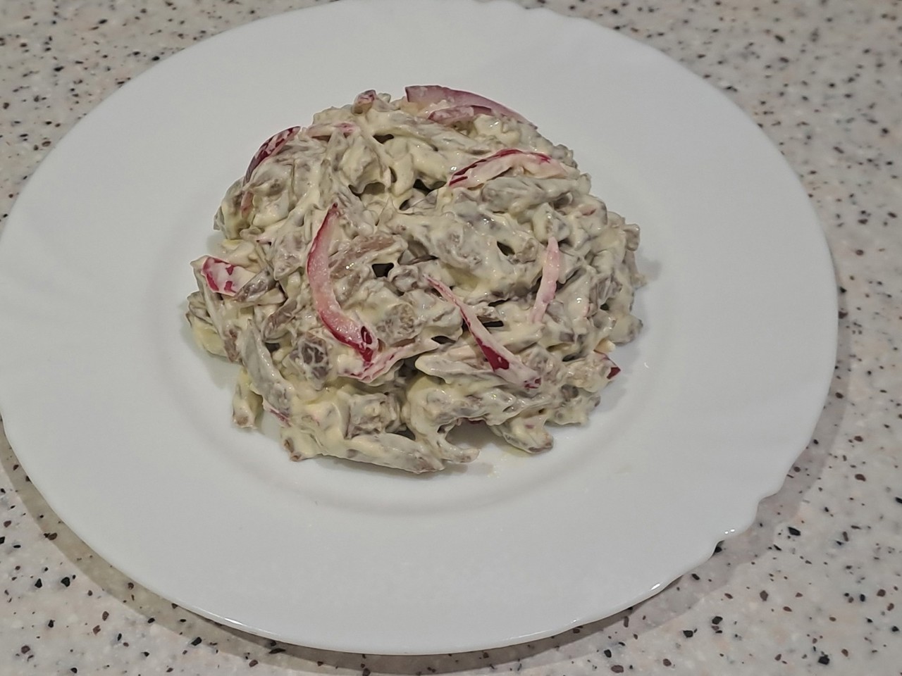 Beef Heart Salad with Pickled Onions