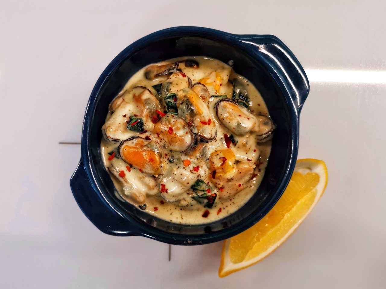 Creamy Mussels in Gorgonzola Sauce with Spinach